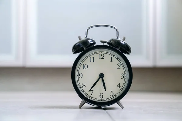 Black alarm clock — Stock Photo, Image