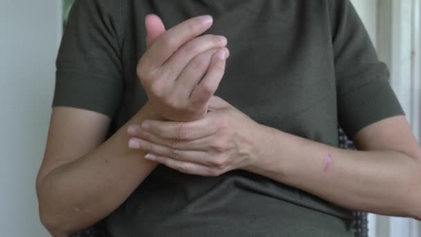 Pain Wrist Woman Hand Touches Wrist Tries Stretch Joint Arthritis — Stock Video