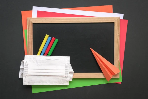 Face Mask Top Black Board Colored Papers Magic Coloring Pens — Stock Photo, Image