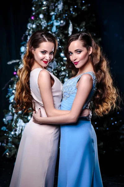 Twins Young Women Evening Dresses Christmas Background Fashion Beauty Portrait — Stock Photo, Image
