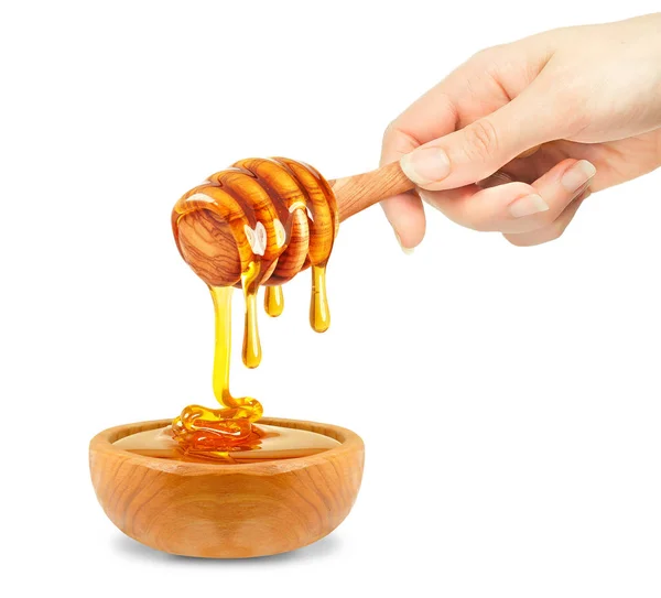 Honing Druipen Een Kom Hand Geïsoleerd Wit — Stockfoto