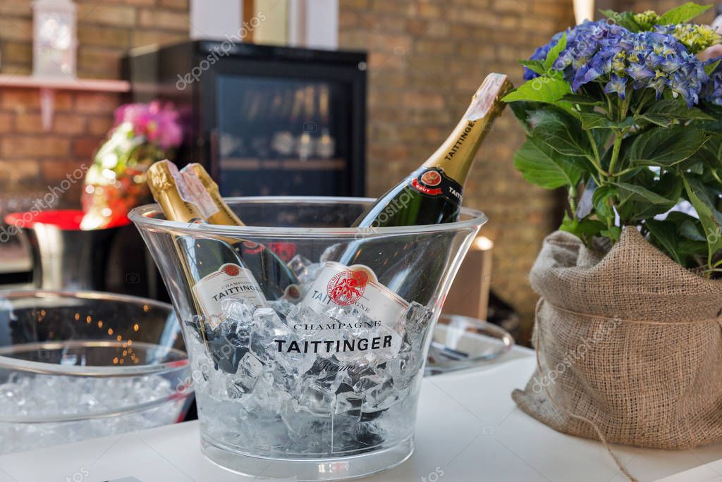 KIEV, UKRAINE - JUNE 02, 2018: Taittinger champagne bar at Kyiv Wine Festival. Big festival of wine and food was organized by Good Wine company, 77 winemakers from around the world took part there.