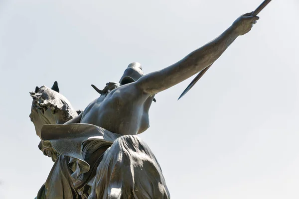 Equestrian woman warrtior with spire statue Fighting Amazon, 1842, by Augustus Kiss. A statue at the entrance to the Old or Altes art Museum in Berlin, Germany.