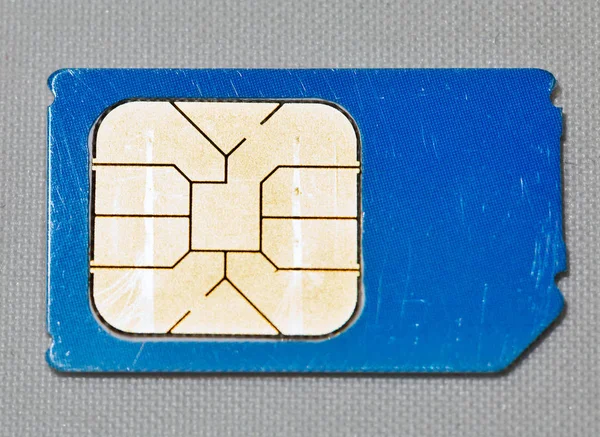 Usado Azul Telefone Celular Cartão Sim Macro Branco — Fotografia de Stock