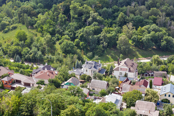 Aerial top view of Kiev suburb houses from above, residential district in capital of Ukraine.