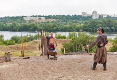 Ukrainian Cossack in Zaporozhian Sich. Khortytsia island, Ukraine. clipart