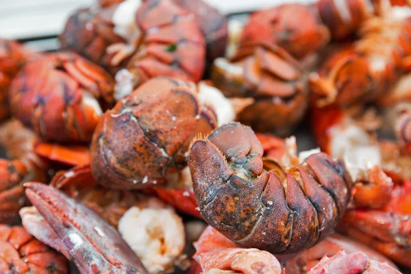 Rabos de lagosta cozidos close-up fundo — Fotografia de Stock
