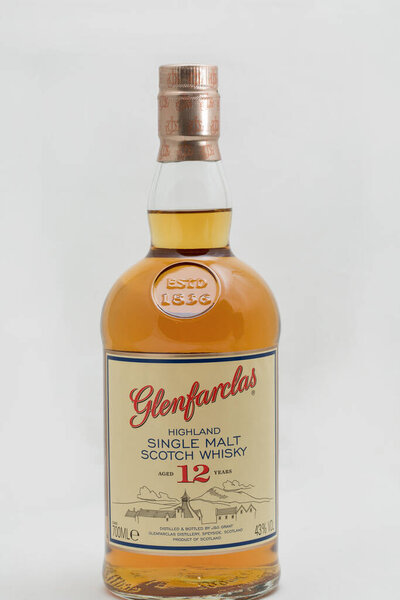 KIEV, UKRAINE - SEPTEMBER 21, 2019: Glenfarclas Highland Single Malt Scotch Whisky bottle against white. It is Speyside single malt Scotch whisky produced at the distillery in Ballindalloch, Scotland.
