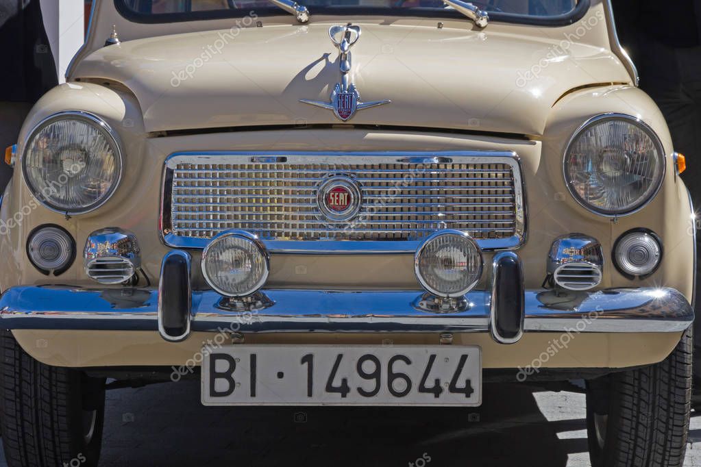 Front view of a vehicle manufactured in Spain between 1957 and 1973. XIV International Concentration of SEAT 600 in in the Plaza Mayor of Leon