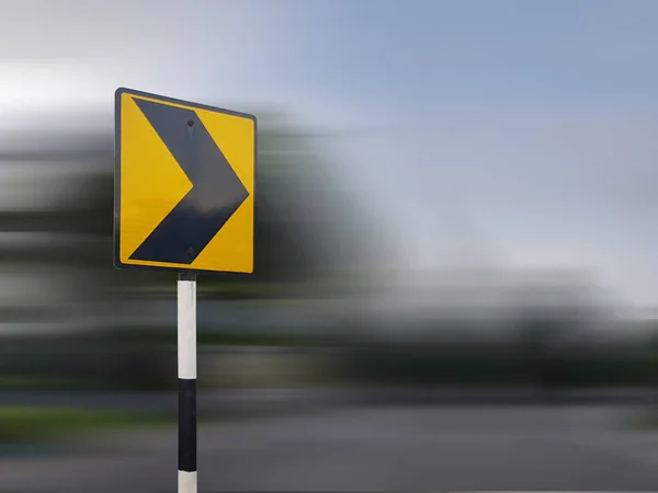 Yellow direction sign - road sign with arrow