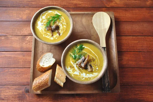 Pumpkin Cream Soup Cream Mushrooms Two Wooden Bowls Wooden Background — Stock Photo, Image