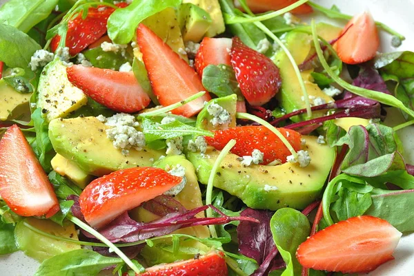 Avocado Salad Strawberries Blue Cheese Arugula Beet Leaves Wooden Background — Stock Photo, Image