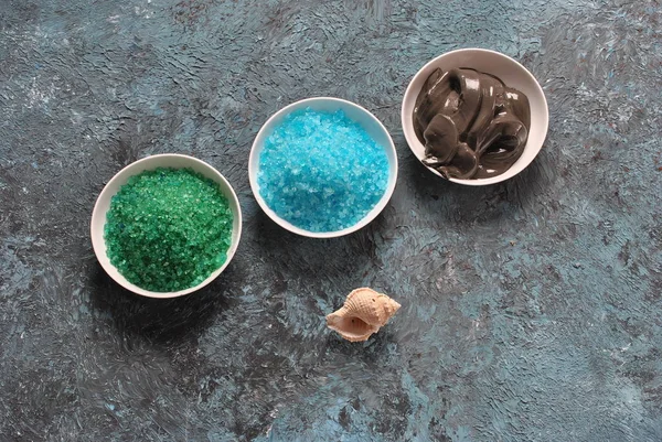 Spa and body care products. Colorful aromatic bath Dead Sea salt black Dead Sea Mud.. Natural ingredients for homemade body salt scrub. Dead Sea cosmetics. Beauty skin care. Spa treatment.