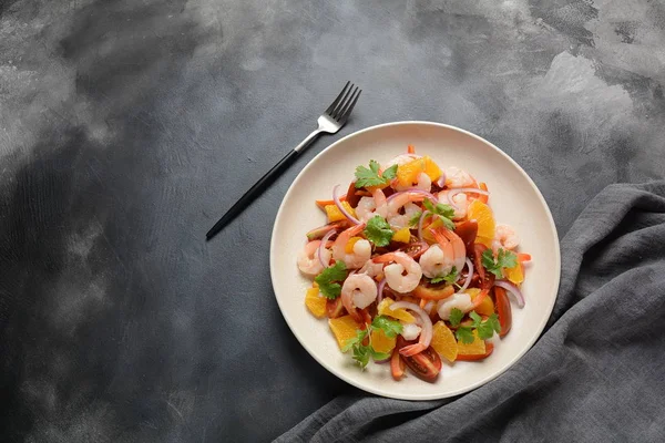 Refreshing dish of fish in citrus juice. Peruvian shrimp, prawn Ceviche marinated in oranges and lime. Diet and healthy food concept. Seafood salad