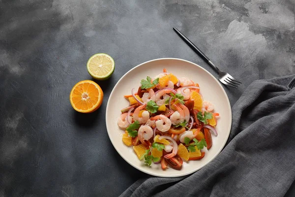 Refreshing dish of fish in citrus juice. Peruvian shrimp, prawn Ceviche marinated in oranges and lime. Diet and healthy food concept. Seafood salad