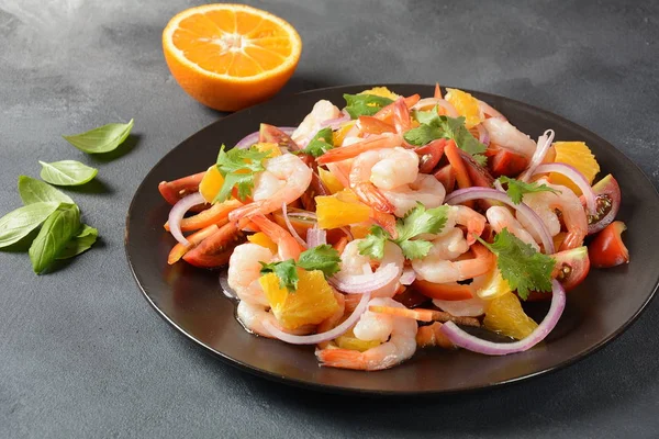 Refreshing dish of fish in citrus juice. Peruvian shrimp, prawn Ceviche marinated in oranges and lime. Diet and healthy food concept. Seafood salad