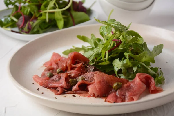 Beef Carpaccio Parmesan Capers Arugula Olive Oil Soy Sauce — Stock Photo, Image