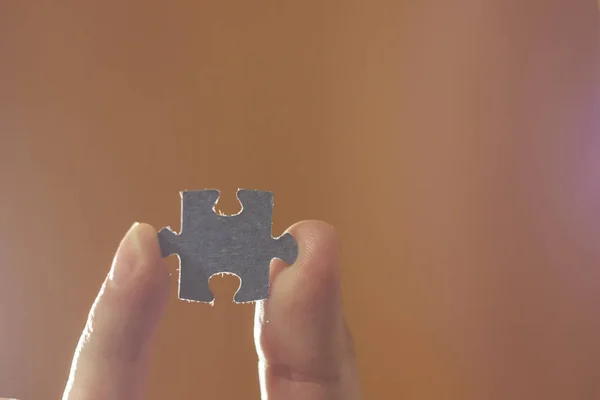 Holding Two Jigsaw Pieces Blank Puzzle Trying Fit Together Blue — Stock Photo, Image