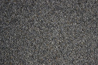 Küçük taş dokulu arka. Sorunsuz doku çakıl. ezilmiş granit doku
