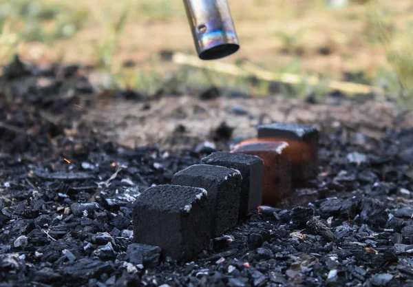 hookah coals with slightly red illumination from warming up