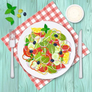 Salata sebzeli damalı masa örtüsü ve ahşap kase