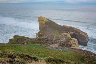 Tünel Beach erken sabah saatleri, yakınındaki Dunedin, Otago, South Island, Yeni Zelanda