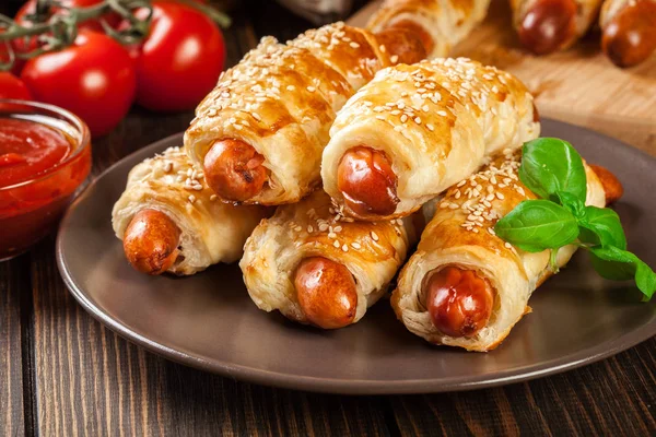 Rolled Hot Dog Sausages Baked Puff Pastry Brown Plate — Stock Photo, Image