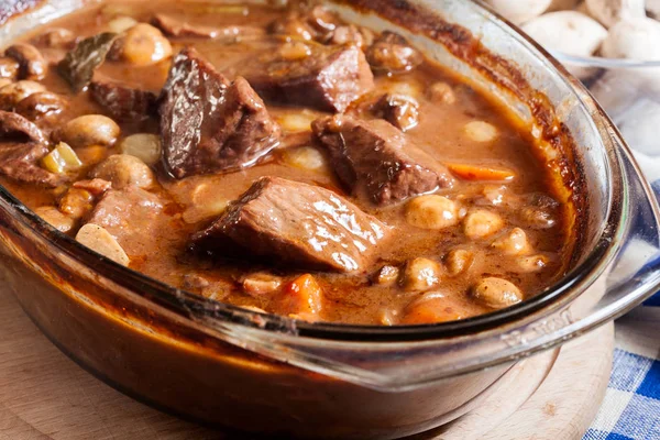 Beef Bourguignon stew in a casserole dish. French cuisine