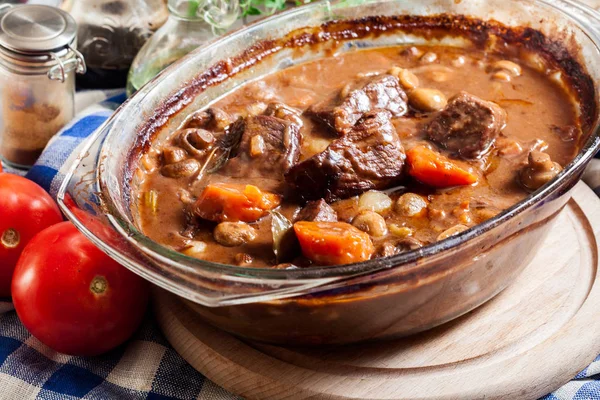 Beef Bourguignon stew in a casserole dish. French cuisine