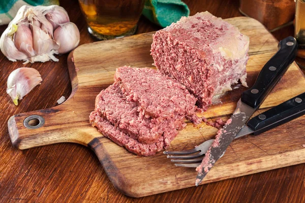 Delicious sliced corned beef on cutting board