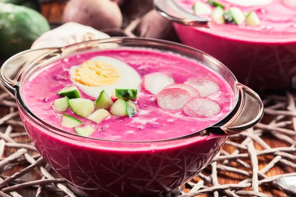 Cold beet soup with egg, cucumber and greens — Stock Image Cold beet soup with egg, cucumber and greens Royalty Free Stock Images