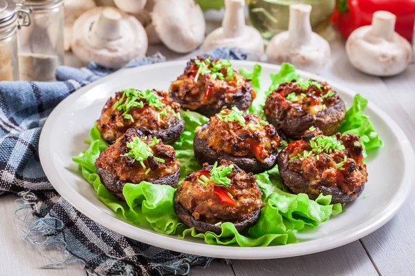 Baked champignon caps stuffed with minced meat — Stock Photo, Image