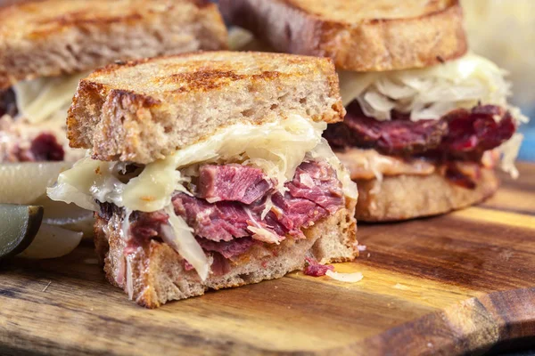 Reuben Sandwich with corned beef, cheese and sauerkraut — Stock Photo, Image