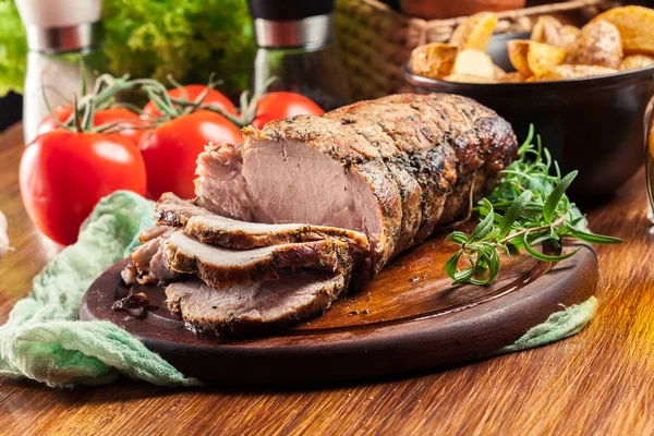 Roasted pork loin with herbs — Stock Photo, Image