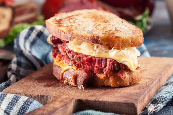 Reuben Sandwich with corned beef, cheese and sauerkraut