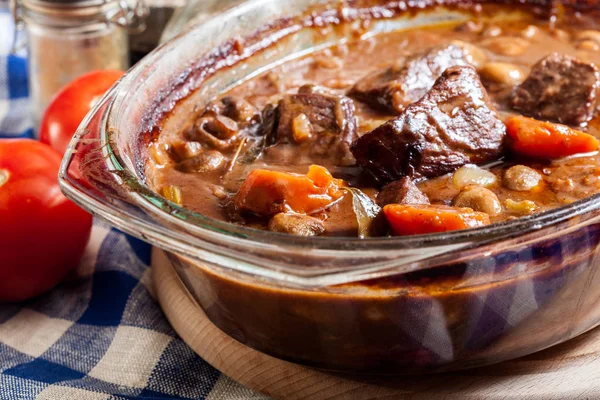 Beef Bourguignon stew in a casserole dish — Stock Photo, Image