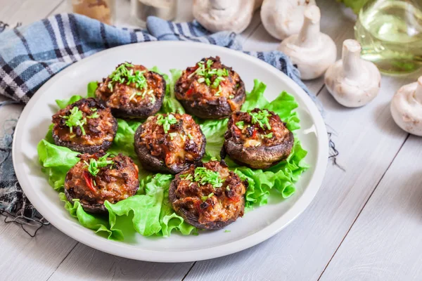 Baked champignon caps stuffed with minced meat — Stock Photo, Image