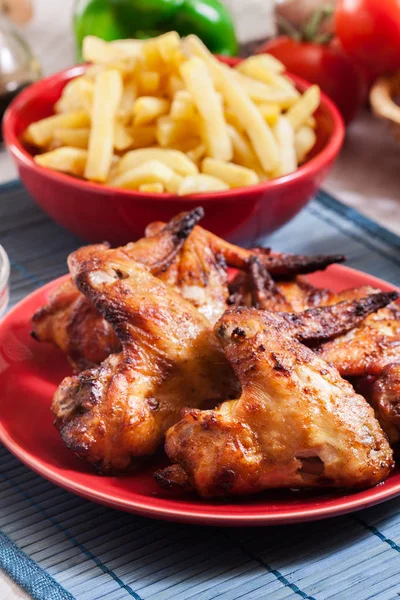 Tasty baked chicken wings — Stock Photo, Image