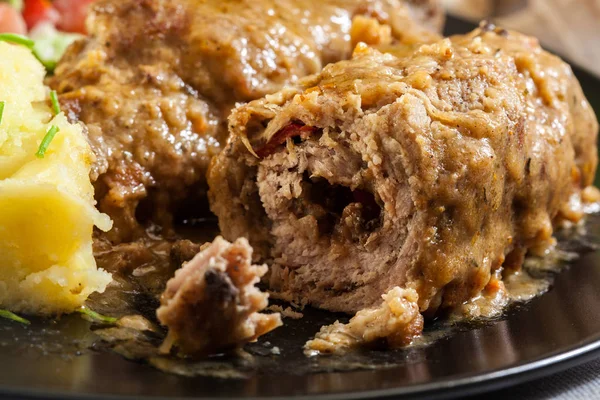 Pork rolls in sauce — Stock Photo, Image