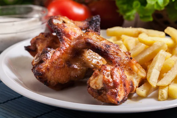 Tasty baked chicken wings — Stock Photo, Image