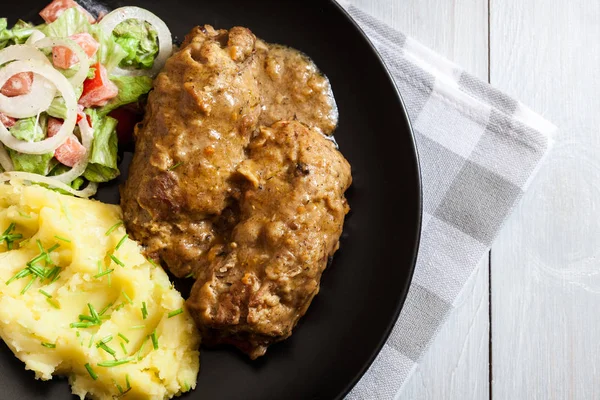 Varkensvlees rollen in saus — Stockfoto