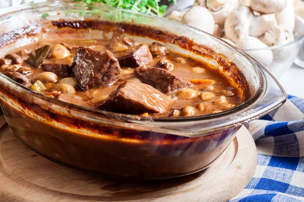 Beef Bourguignon stew in a casserole dish — Stock Photo, Image