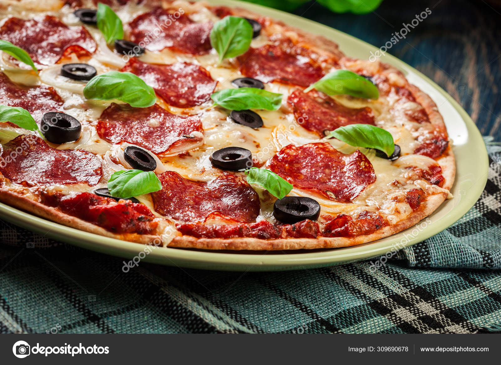 Pizza pepperoni with olives served Stock Photo by ©fotek 309690678