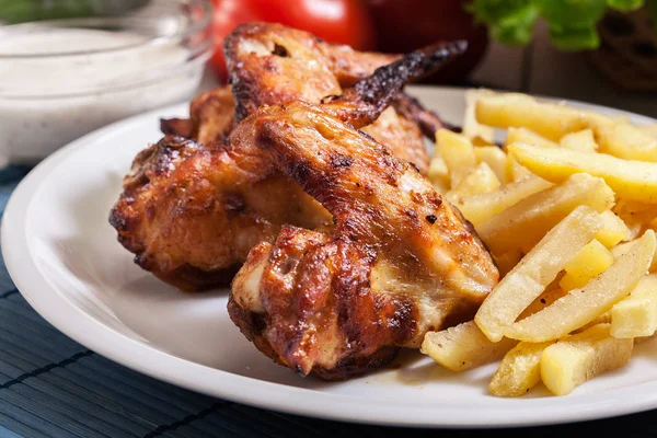 Tasty baked chicken wings — Stock Photo, Image