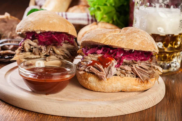 Pulled pork sandwich with red cabbage and bbq sauce