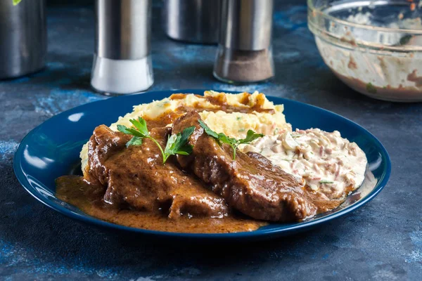 Stewed pork neck with potatoes and sauce — Stock Image Stewed pork neck with potatoes and sauce Stock Picture