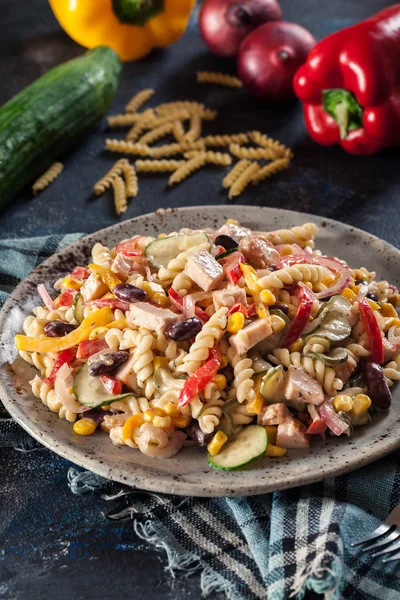 Fusilli pasta salad with smoked turkey