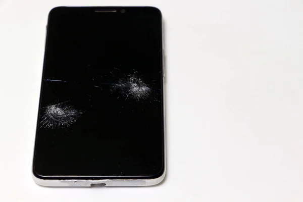 Broken phone on white background isolated