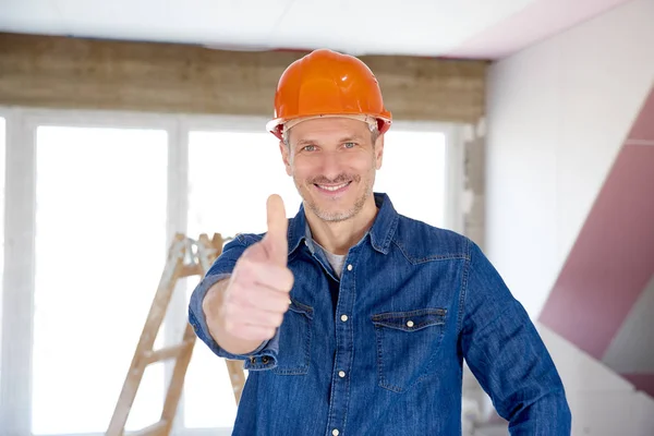 Portrait Smiling Handyman Wearing Safety Helmet Showing Thumb While Looking — Stock Photo, Image