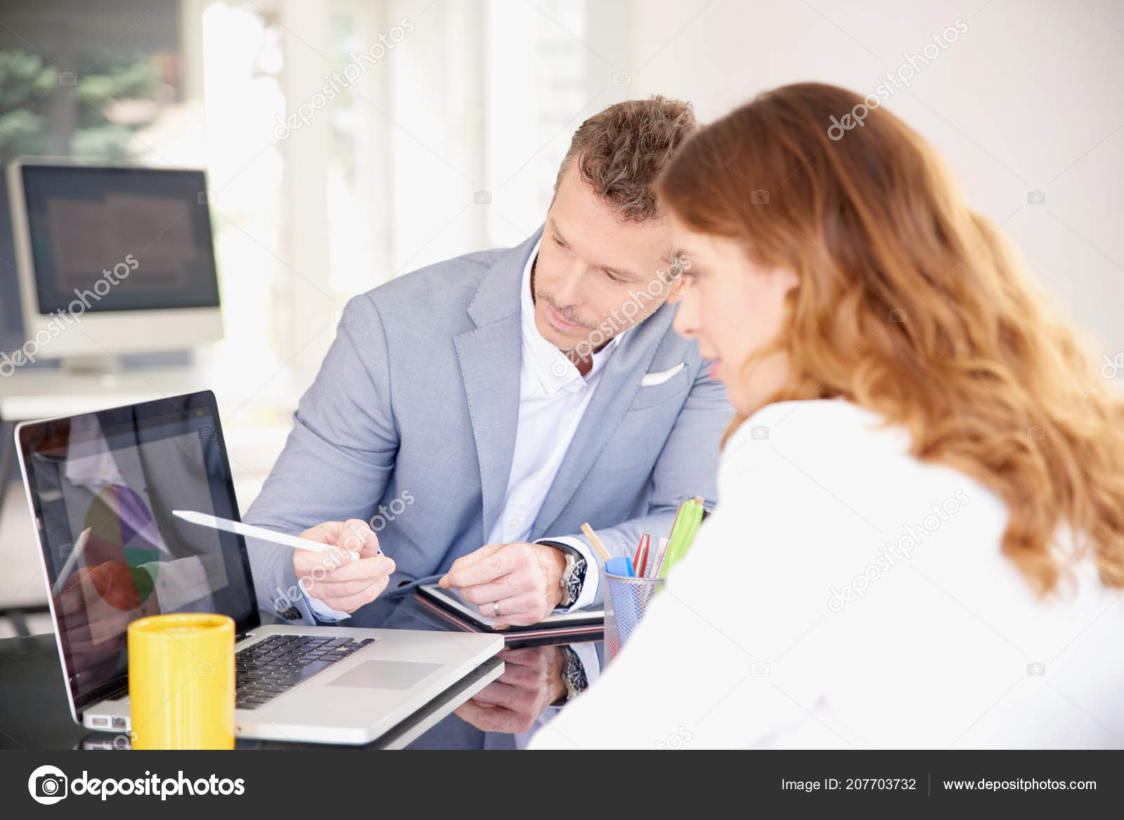 group sales business people sitting front laptop consulting while sales business